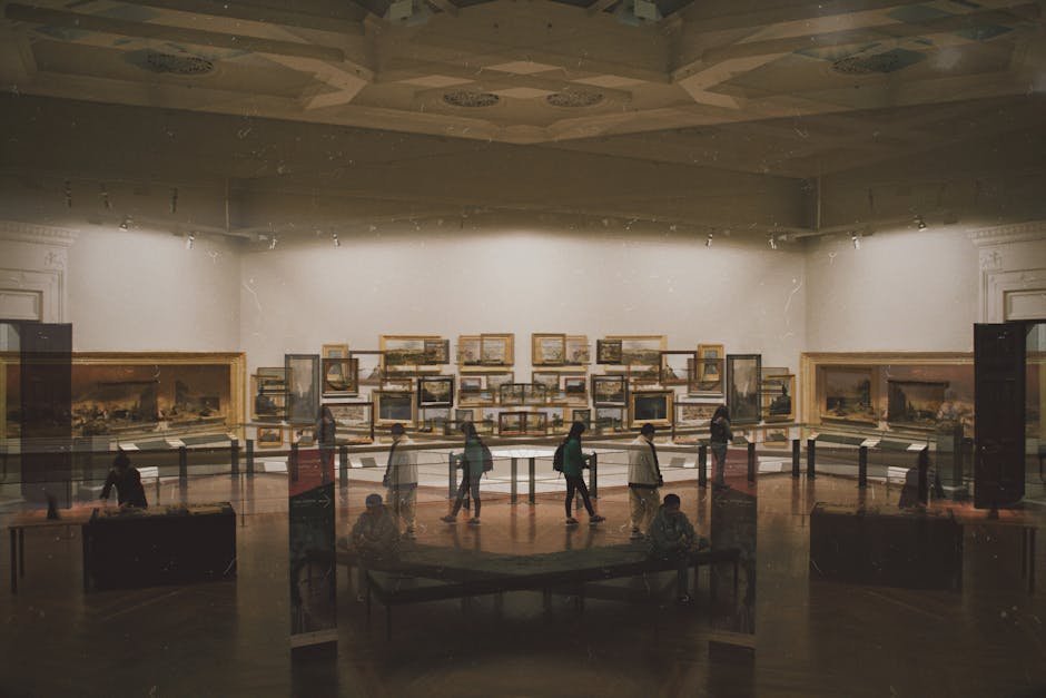 Explore a captivating art gallery interior featuring various artworks and visitors in Melbourne.